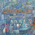 MAN IN A GARAGE