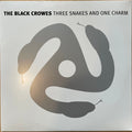 Three Snakes And One Charm