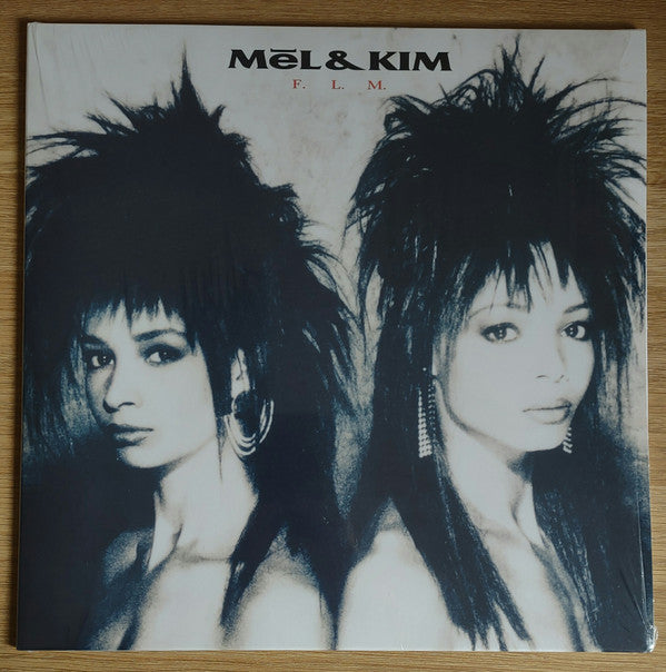 F.L.M.