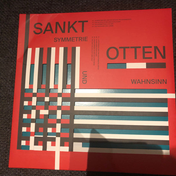 SYMMETRIE UND WAHNSINN