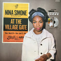 AT THE VILLAGE GATE